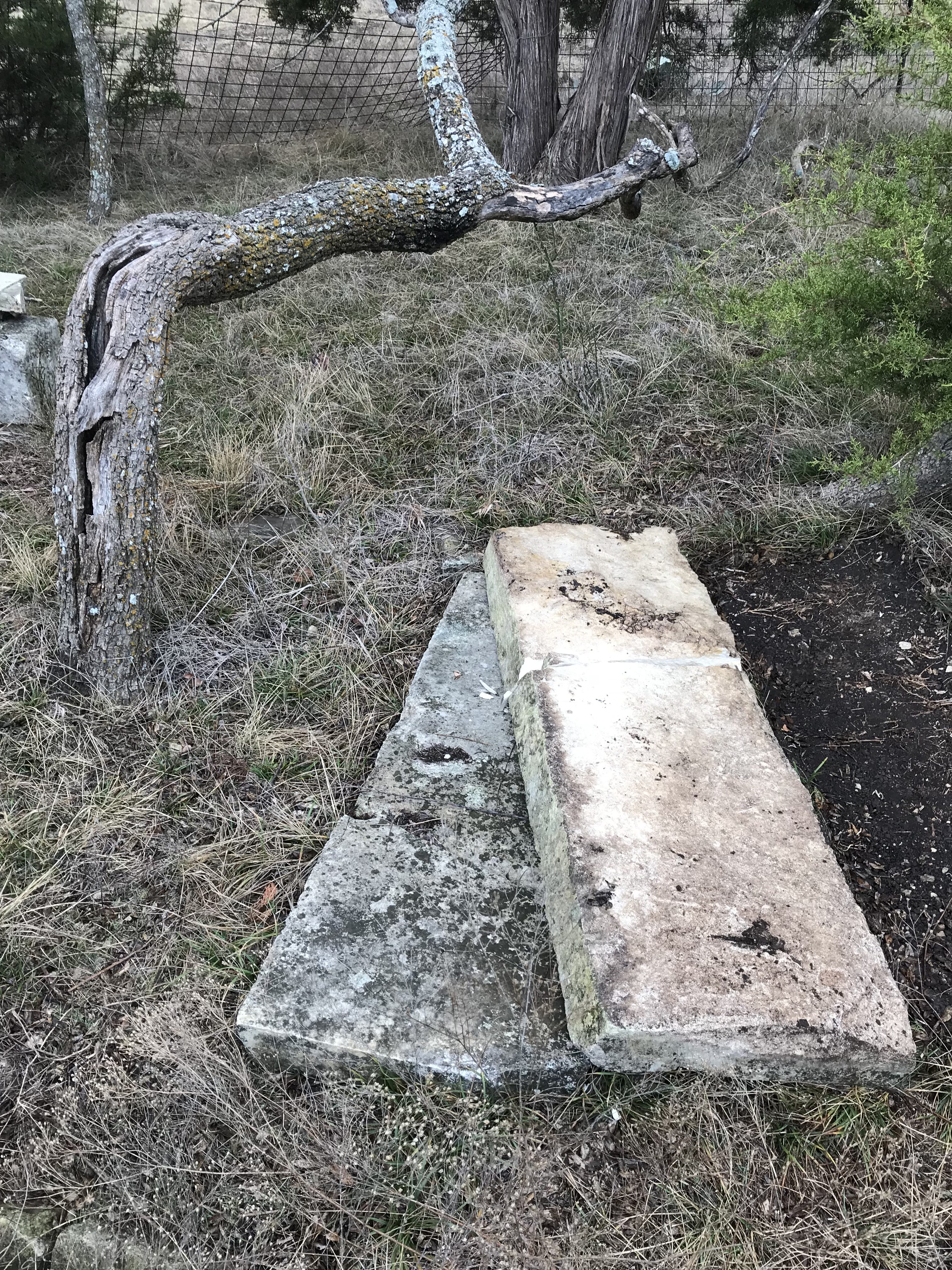 Mauldin subdividing construction looking at limestone slabs in gravesite fenced in area Photo Courtesy Nancy Bell January 2018